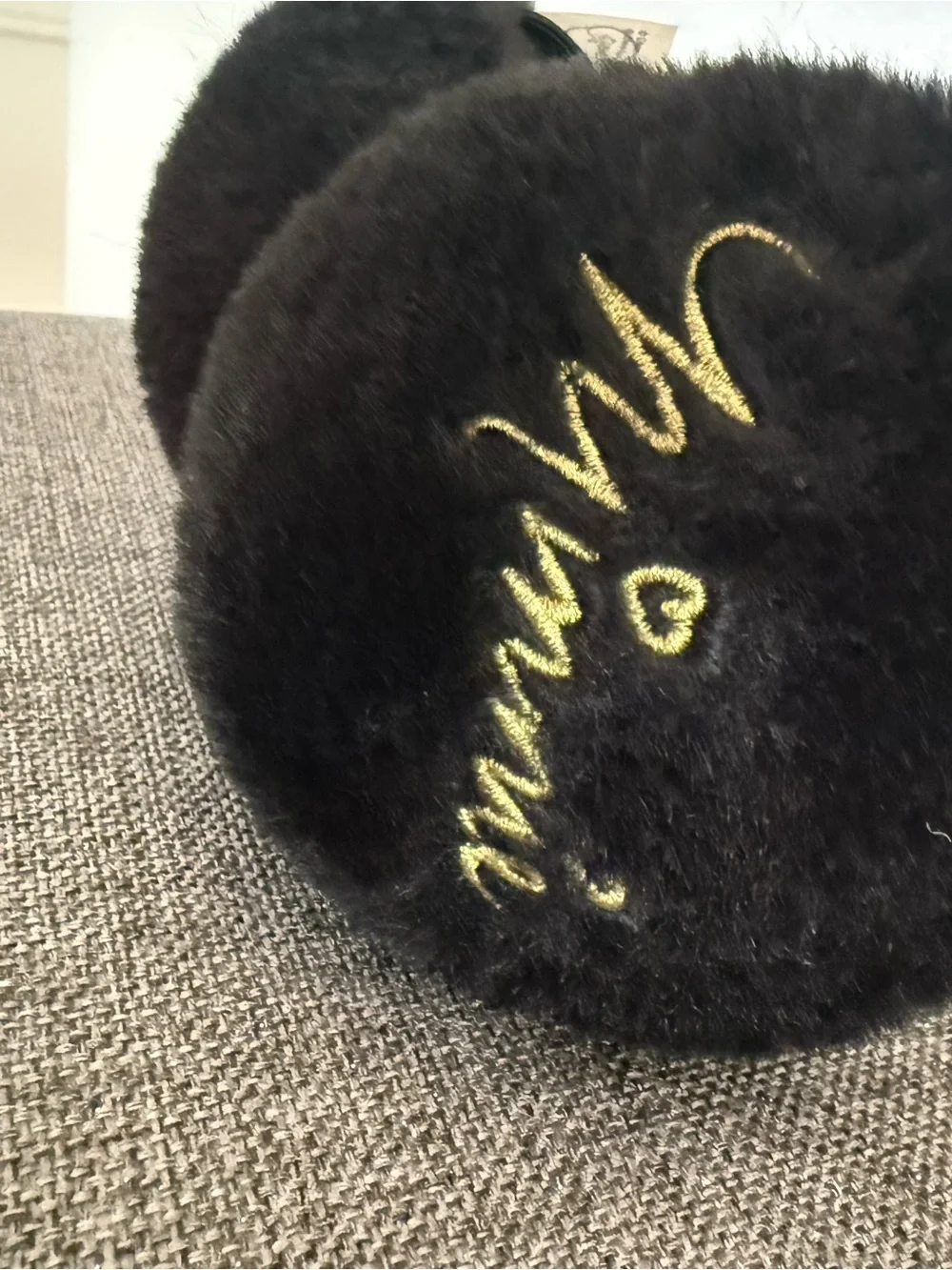 Disney Black Fuzzy Minnie Ear Muffs with Red Polka Dot Bow